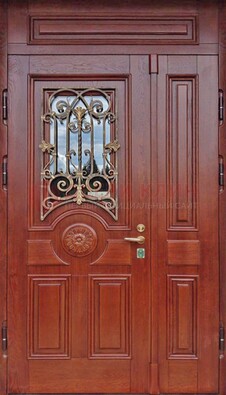 Филенчатая железная дверь со стеклом и ковкой ДСК-204 в Жуковском