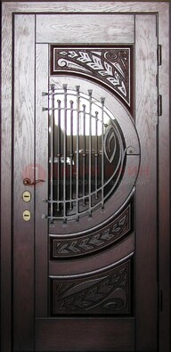 Одностворчатая входная дверь со стеклом и ковкой ДСК-21 в Ногинске