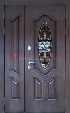 Темная металлическая дверь Винорит со стеклом и ковкой ДСК-239 в Жуковском